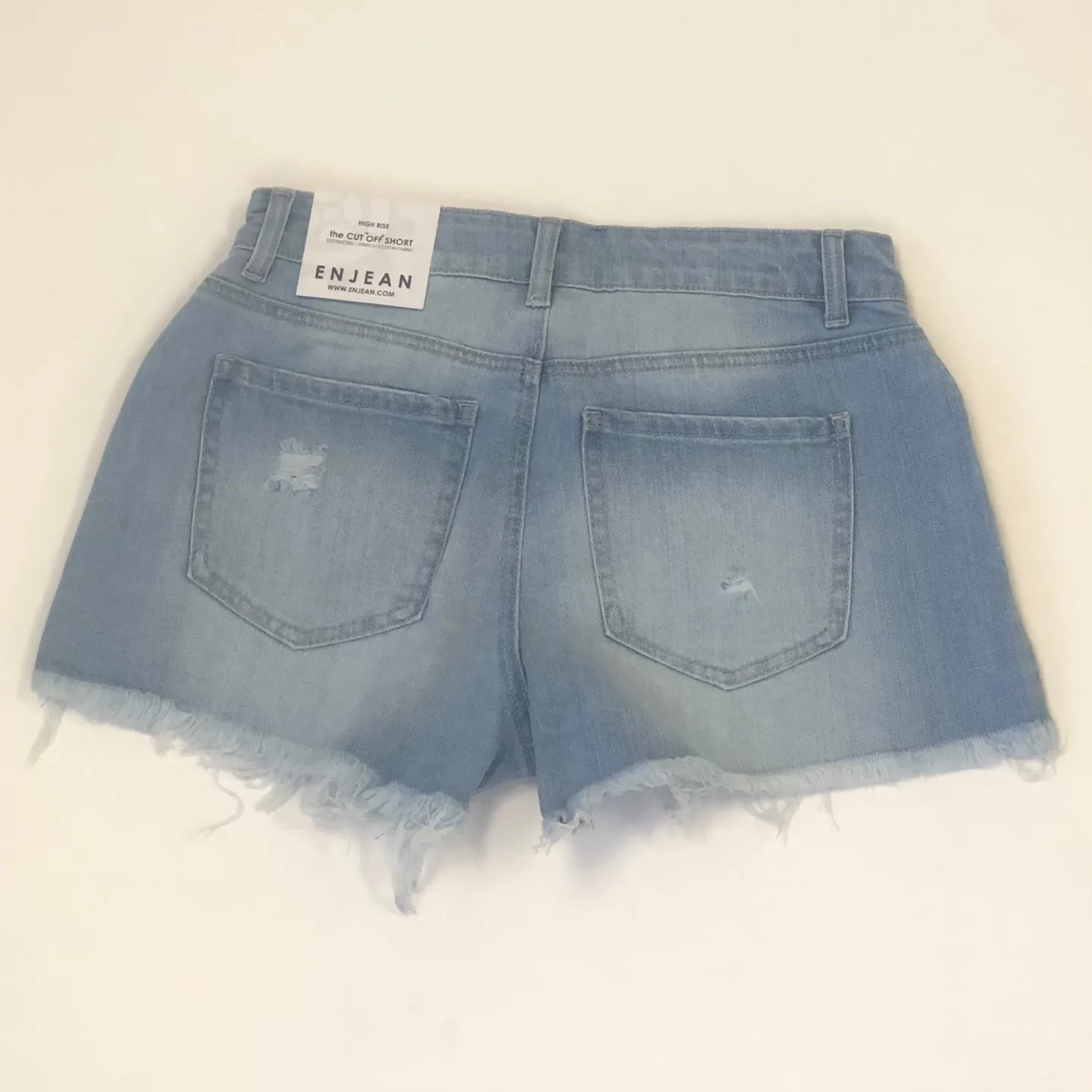 Woman's Highrise Destructed Denim Short